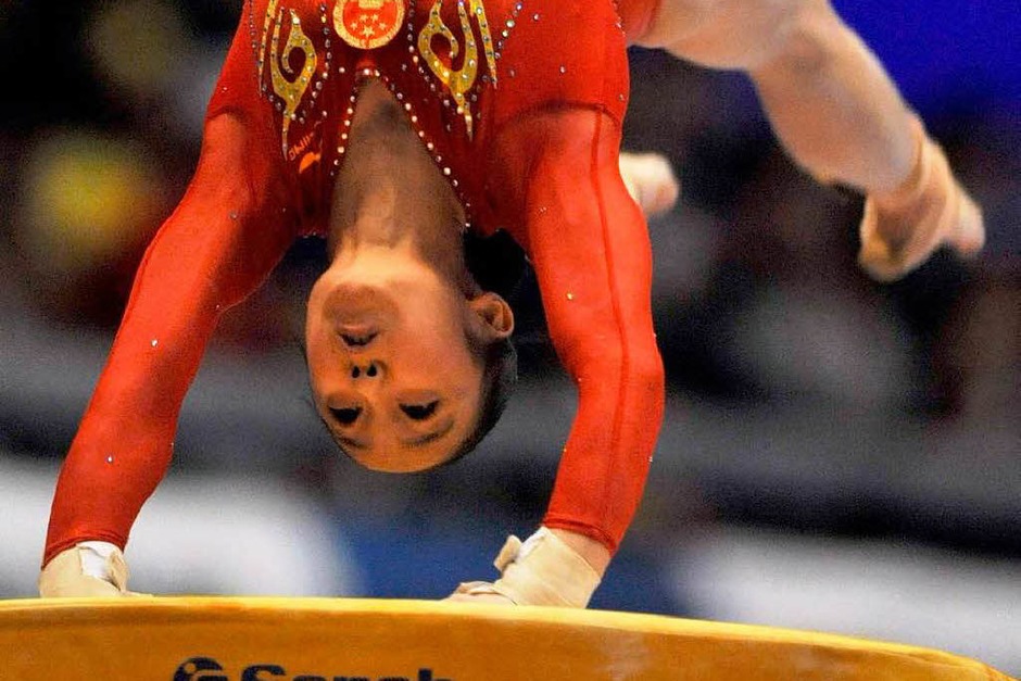 Huang Qiushuang (China) beim Sprung (Foto: dpa) Huang Qiushuang (China) beim Sprung (Foto: dpa)