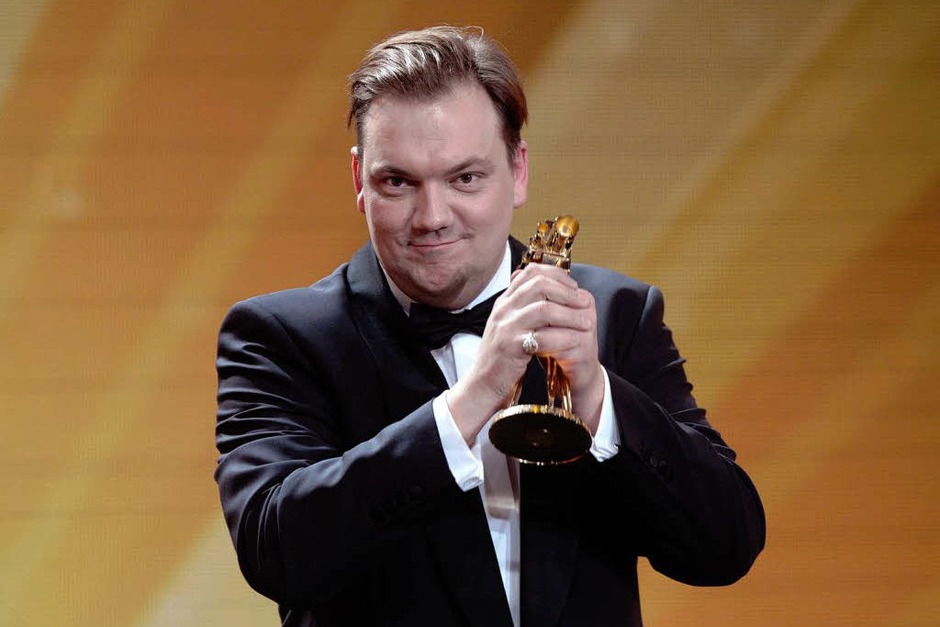 Schauspieler Charly Huebner nach seiner Auszeichnung in der Kategorie "Bester deutscher Schauspieler". (Foto: dapd) Schauspieler Charly Huebner nach seiner Auszeichnung in der Kategorie "Bester deutscher Schauspieler". (Foto: dapd)