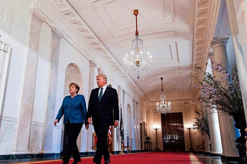 Fotos vom ersten Treffen zwischen Donald Trump und Angela Merkel. (Foto: AFP) Fotos vom ersten Treffen zwischen Donald Trump und Angela Merkel. (Foto: AFP)