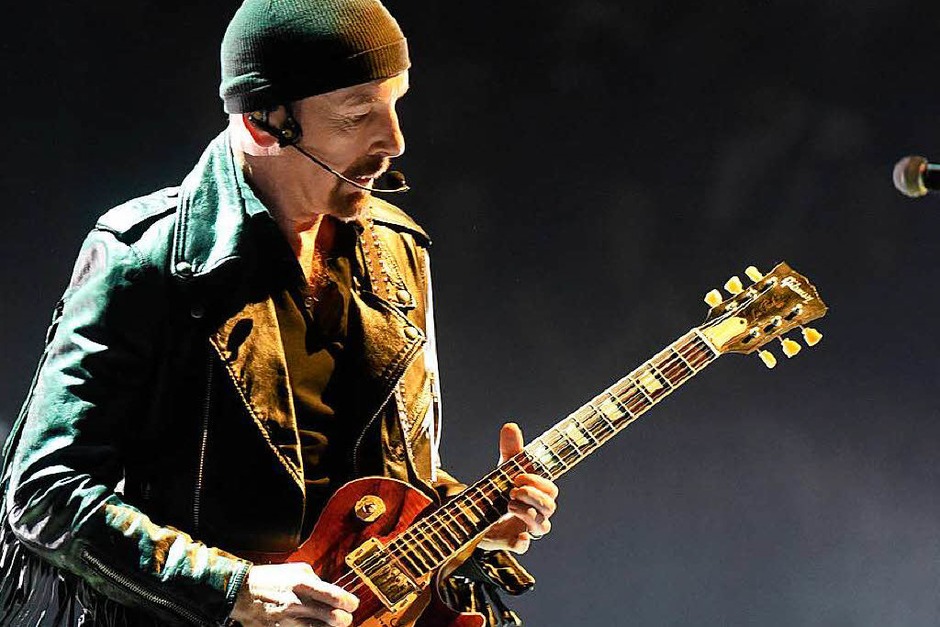 The Edge, Gitarrist von U2 mit einer Gibson (Foto: Henning Kaiser) The Edge, Gitarrist von U2 mit einer Gibson (Foto: Henning Kaiser)