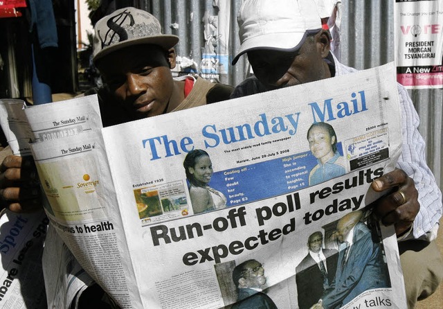 Viel Neues werden diese beiden Mnner ..., dass Mugabe erneut Prsident wird.    | Foto: AFP