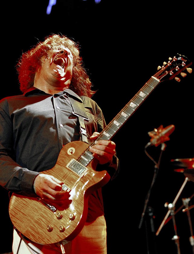 In der Pose des Gitarrenhelden: Gary Moore   | Foto: ARchivfoto: afp