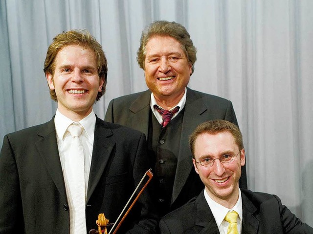 Christian Quadflieg (Mitte) mit den mu...tern Michael Bahlke und Gregor Dierck.  | Foto: promo