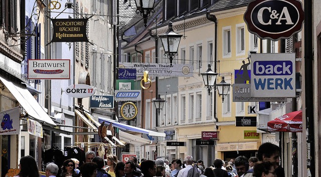 Ob auf Sonnenschirmen (oben links), Gr...Freiburger Innenstadt allgegenwrtig.   | Foto: Fotos: Ingo Schneider