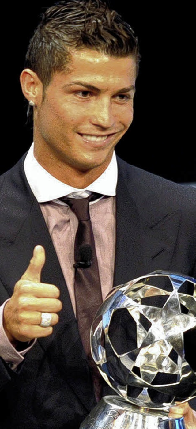 Fuball-Beau Cristiano Ronaldo (Manche...ischer  Vereinsspieler ausgezeichnet.   | Foto: dpa
