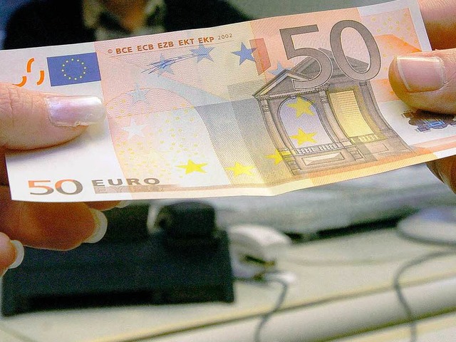 Bei der Entgegennahme von 50-Euro-Sche...zupassen, sie knnten  geflscht sein.  | Foto: ddp