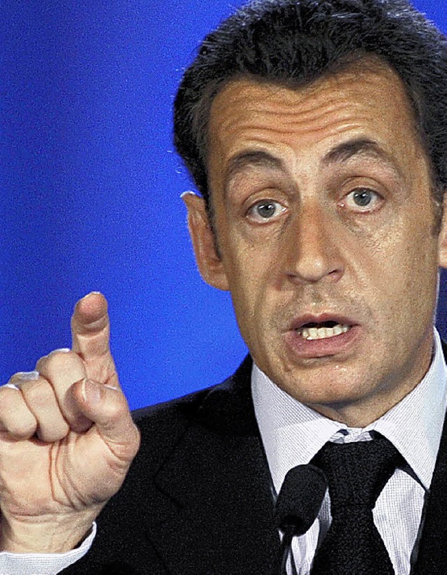 Die Welt hrt auf ihn: Nicolas Sarkozy gibt den Weg vor.  | Foto: AFP