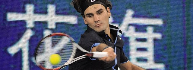 Der Rcken schmerzt, die Gegner sind zh: Roger Federer hat Mhe bei der WM.   | Foto: afp