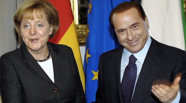 Whrend Auenminister Steinmeier ein K...ens Regierungschef Silvio Berlusconi.   | Foto: DPA