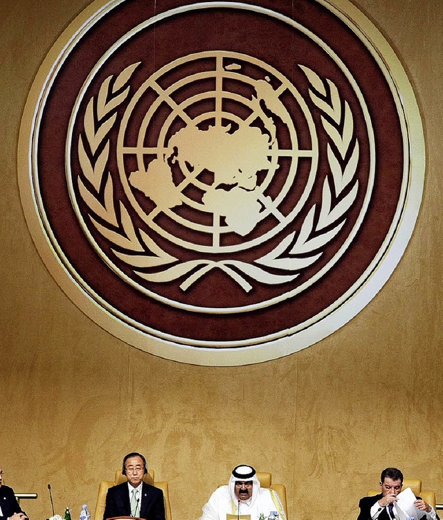UN-Generalsekretr  Ban Ki Moon (links...am Samstag die UN-Konferenz in Doha.    | Foto: afp