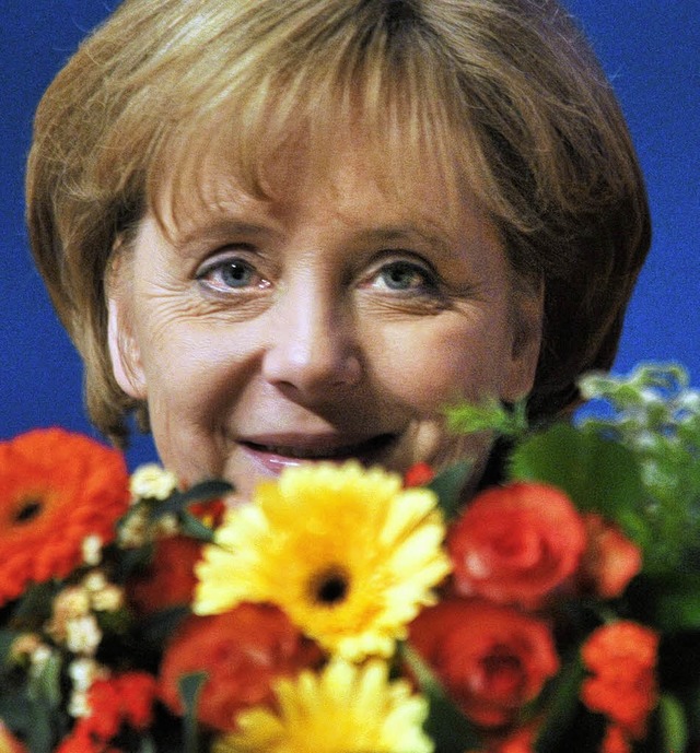 Wiedergewhlt: A. Merkel   | Foto: dpa