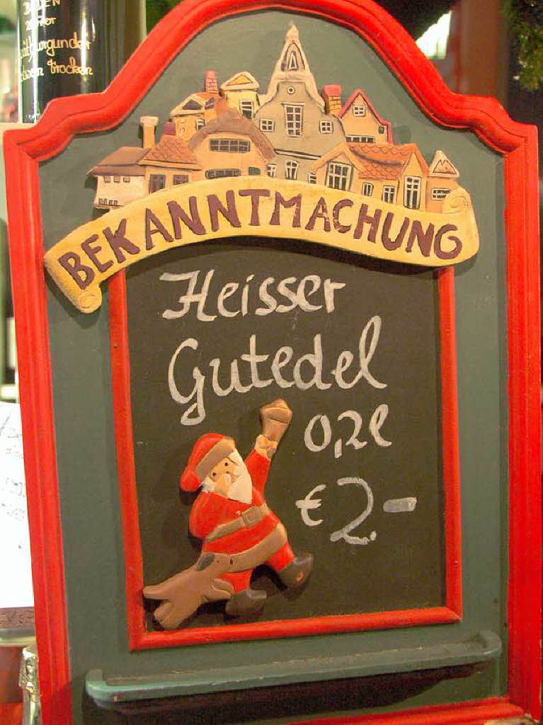 Lichterglanz, Glhwein, Coca-Cola – und das alles mit Schneeflckchen zur Erffnung des Weihnachtsmarktes in Bad Krozingen