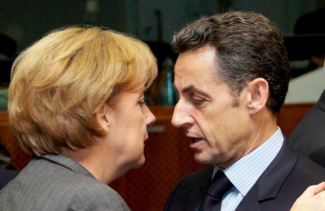 Angela Merkel und Nicolas Sarkozy: Bis...m Details des EU-Konjunkturprogramms.   | Foto: dpa