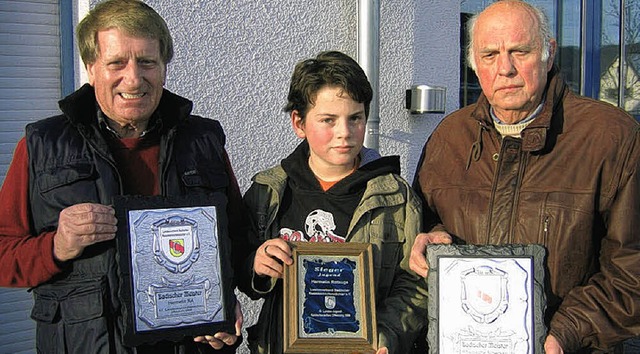 Elmar Kloos, sein Enkel Benjamin Kloos...hren Tieren in Offenburg erfolgreich.   | Foto: Otto Selb