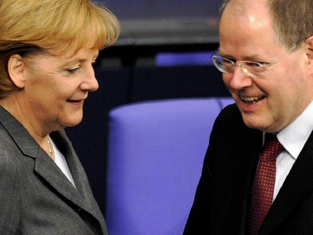 Zwei der Architekten des Konjunkturpaketes: Angela Merkel, Peer Steinbrck.  | Foto: dpa