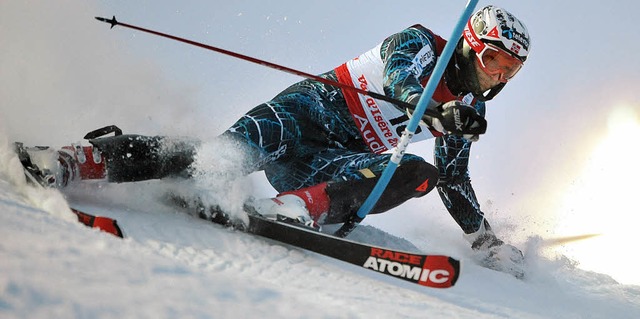 Spitzen-Kurvenlage in der Super-Kombin...ger Aksel Lund Svindal ist Weltmeister  | Foto: afp