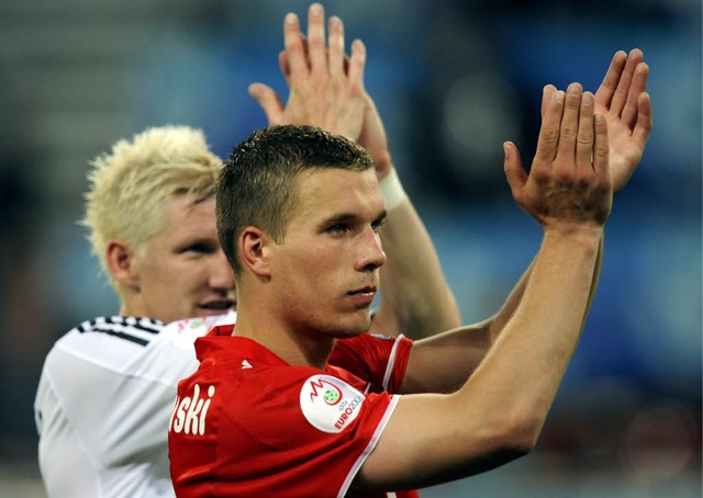 Lukas Podolski hat sich in den Vorderg... im Nationalteam nur der Hintergrund.   | Foto: ddp
