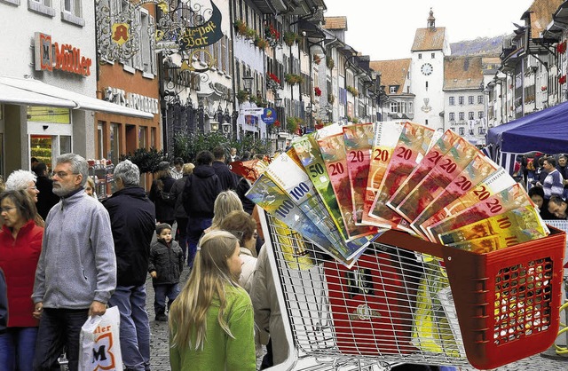 Die Schweizer kaufen nach wie vor in W... beschftigt vor allem die Politiker.   | Foto: Fotomontage: Berndt