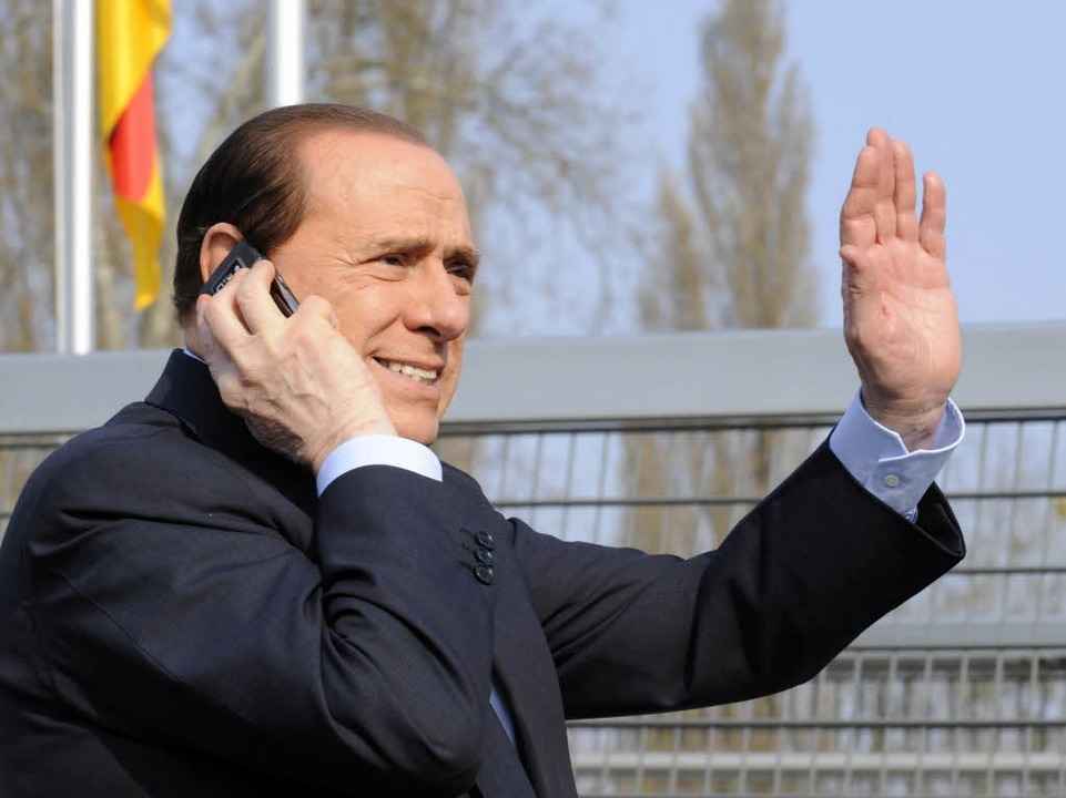 Der Handy-Mann: Silvio Berlusconi.  | Foto: dpa