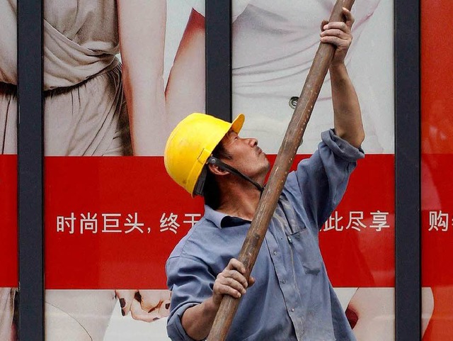 Chinas Arbeiter haben immer noch alle ...mer als in den zurckliegenden Jahren.  | Foto: dpa