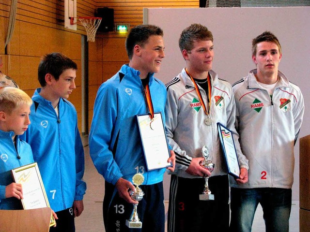 Tim Scherer, Adrian Herth, Deutscher M... Neuzugang Fabio Tascillo  (von links)  | Foto: rombach