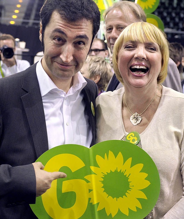 Die  Parteivorsitzenden  der Grnen, C...em Aufdruck:   Go (Auf geht&#8217;s).   | Foto: DPA