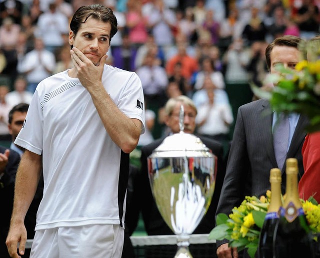 Die Insignien des Sieges im Visier: Thomas Haas nach seinem Sieg in Halle    | Foto: ddp