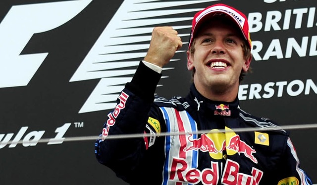 Yeah, denen hab&#8217; ich&#8217;s gez...bastian Vettel auf dem Siegerpodest.    | Foto: afp