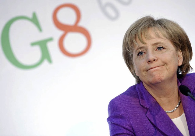 Zufrieden mit sich, der Welt und den Umfragewerten: Angela Merkel  | Foto: DDP/DPA