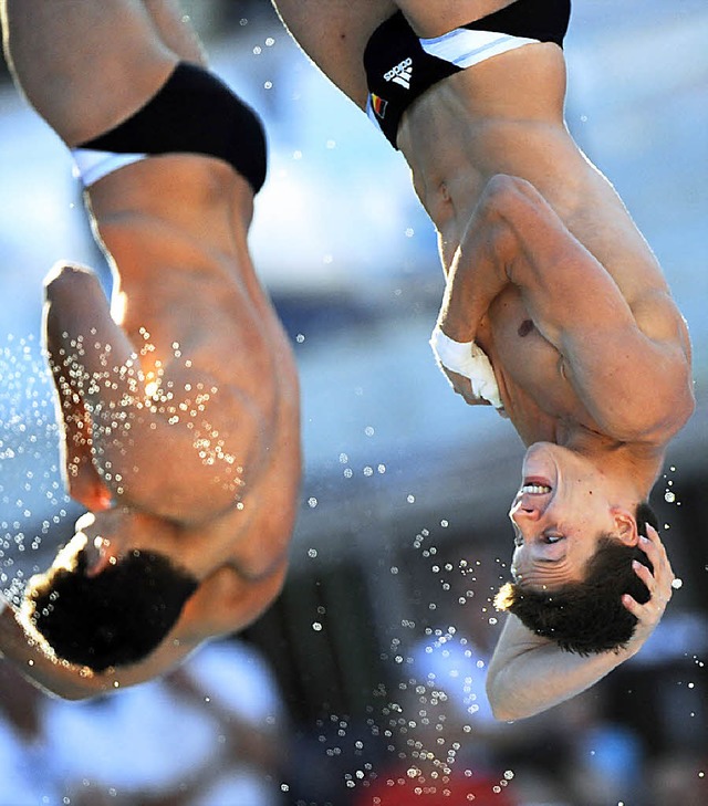 Kopfber: Die deutschen Athleten Steph... Wasserspringen vom Drei-Meter-Brett.   | Foto: dpa