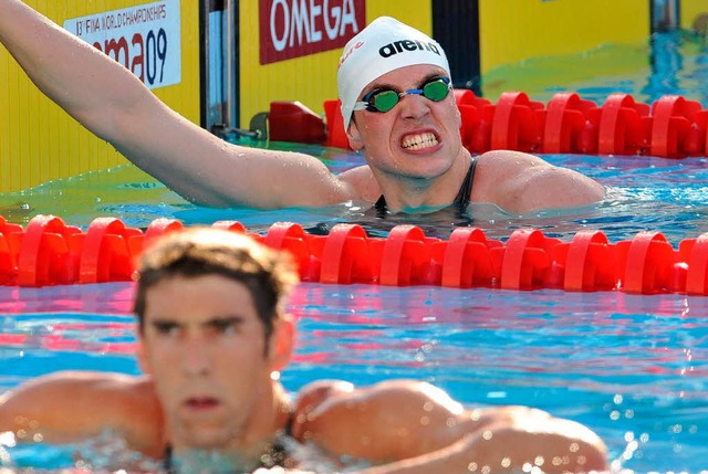 Phelps (vorne) und Biedermann  | Foto: dpa