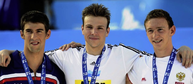 Paul Biedermann (MItte) freut sich be...ila Issotow ist mit Bronze zufrieden.   | Foto: afp