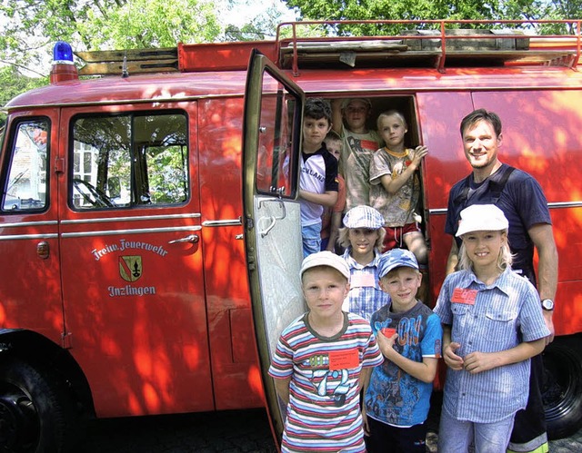 Eine Fahrt mit dem Feuerwehrauto ist f...e Ferienkinder etwas ganz Besonderes.   | Foto: Johanna Hgg