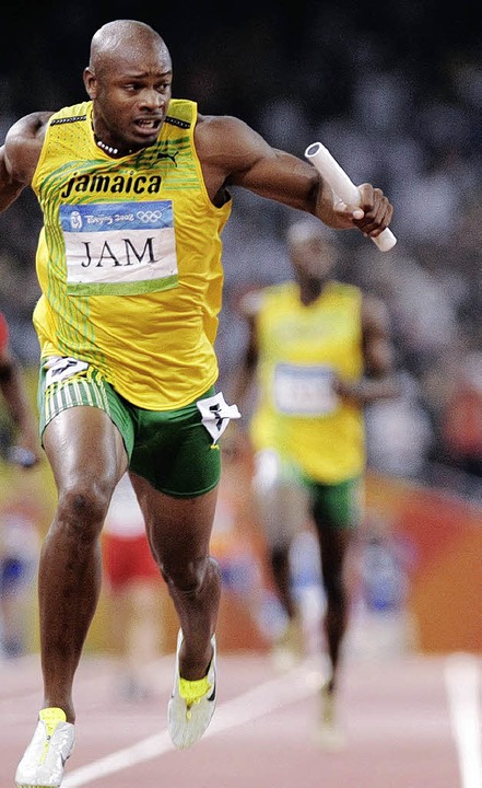 Führte Jamaika 2008 als Schlussläufer ...auch bei der WM dabei:  Asafa Powell    | Foto: afp