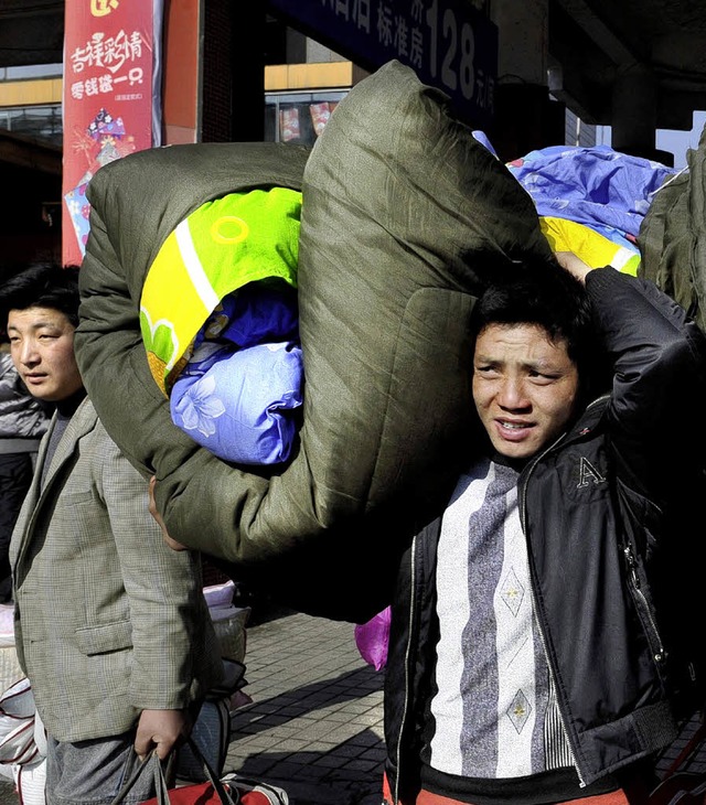 Wanderarbeiter in China: stndig unterwegs  | Foto: dpa