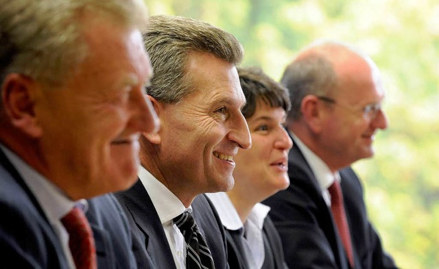 Ernst Pfister (FDP), Ministerprsident...ngere Laufzeiten fr AKWs (von links).  | Foto: dpa