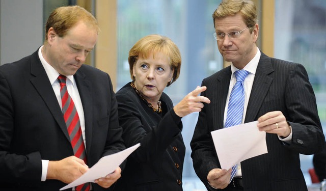 Die Liberalen Dirk Niebel (links) und ... langgeht in den Koalitionsgesprchen.  | Foto: AFP