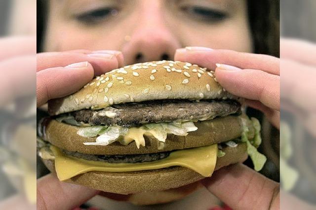 Den Burger mitnehmen macht McDonald's Freude