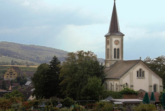 Mitten im historischen Ortskern von Laufen: die  evangelische  Pfarrkirche    | Foto: Sigrid Umiger