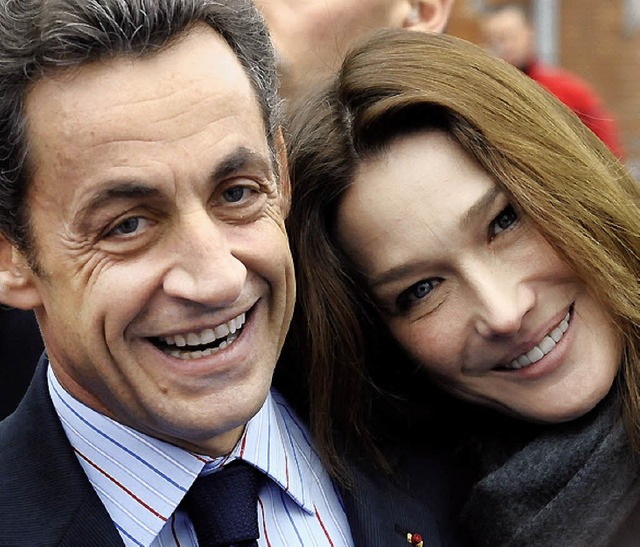 Staatsprsident Nicolas Sarkozy mit seiner Frau Carla Bruni   | Foto: AFP