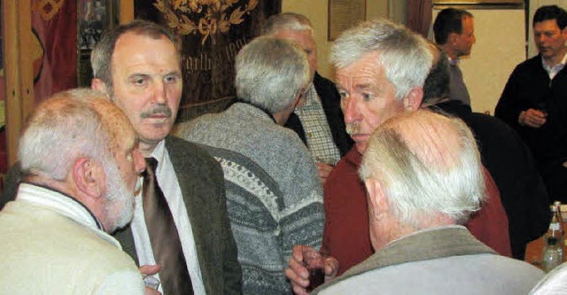 Beim Neujahrsumtrunk im Hgelberger Ra...ermeister Rainer Knig austauschen.     | Foto: Erika Dietrich