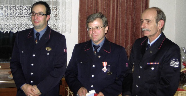 Aiterns Feuerwehrkommandant Markus Wun...dmeister Hildolf Schwald (von links).   | Foto: Privat