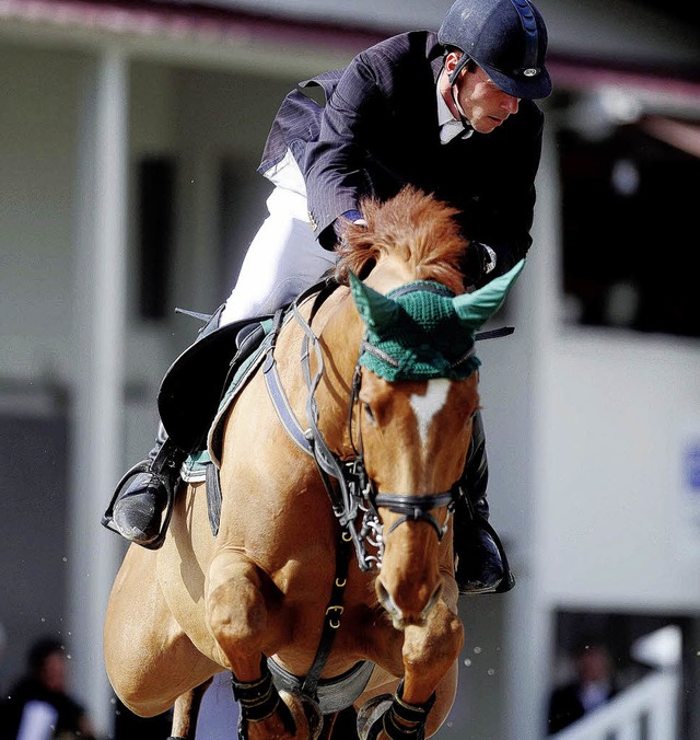 Sieg bei  Baden Classics: Hans-Dieter Dreher auf Lasandro   | Foto: Schn