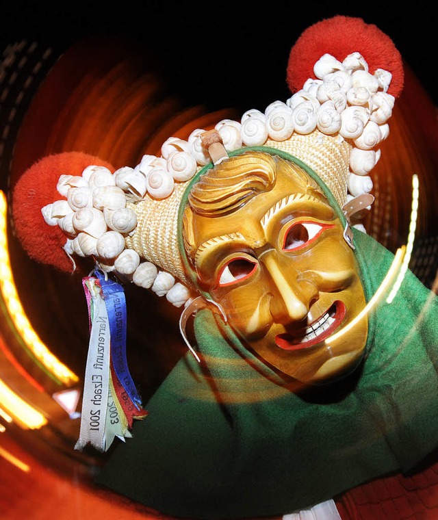 Eine der ltesten Narrenmasken der alemannischen Fasnet: der Schuttig  | Foto: dpa