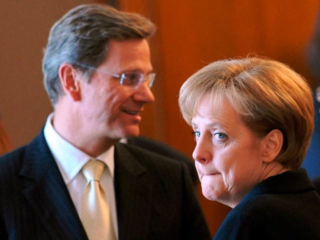 Temporre Kontaktstrung: FDP-Chef Gui...lle  und Bundeskanzlerin Angela Merkel  | Foto: dpa