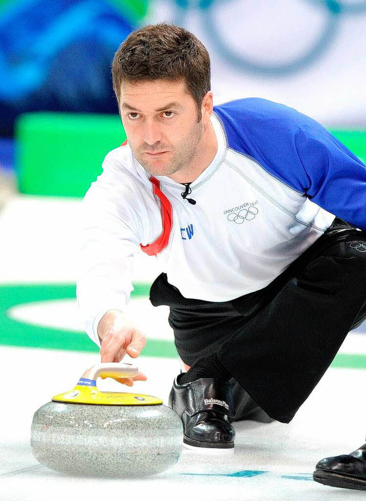Thomas Dufour aus Frankreich: Beim Curling ist Przisionsarbeit gefragt.