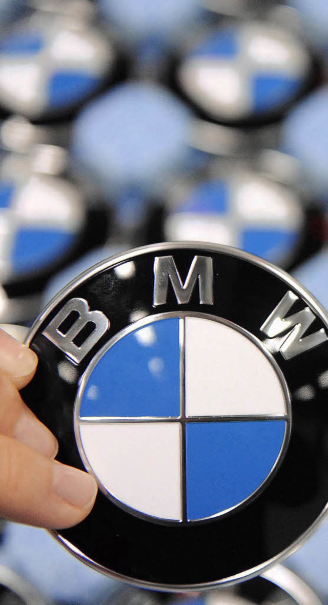 Die blau-weien Felder im BMW-Logo signalisieren bayerischen Optimismus.   | Foto: DDP