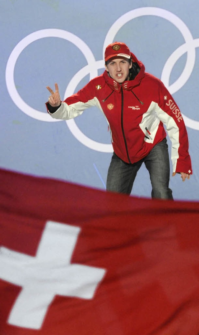Simon Ammann nach seinem Sieg von der Normalschanze   | Foto: afp