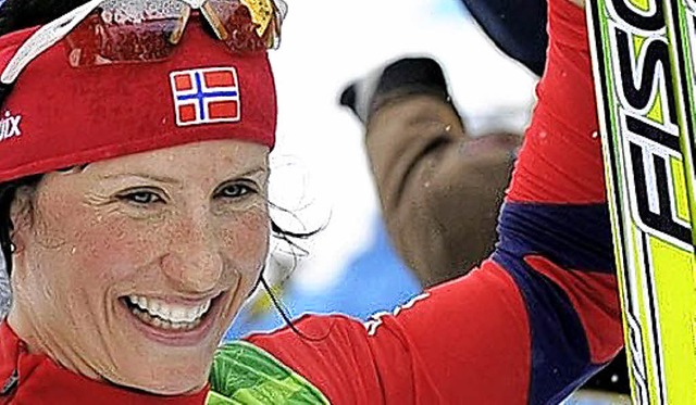Unbeeindruckt vom Wetterchaos: Gold-Knigin Marit Bjrgen aus Norwegen.   | Foto: DPA
