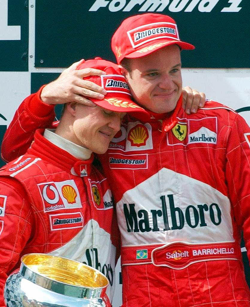 Die berchtigte Stallregie von Ferrari: Schumacher war der Profiteur, sein Teamkollege Rubens Barrichello 2002  der Leidtragende.